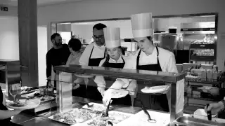 Chefs and students cooking at the Norwegian Seafood Council's offices