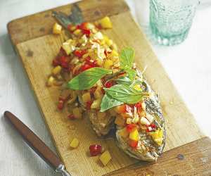Fried sea bream with peppers and chillis