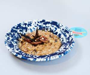 Foodism's salted caramel milk stout porridge with maple-candied bacon and pecans